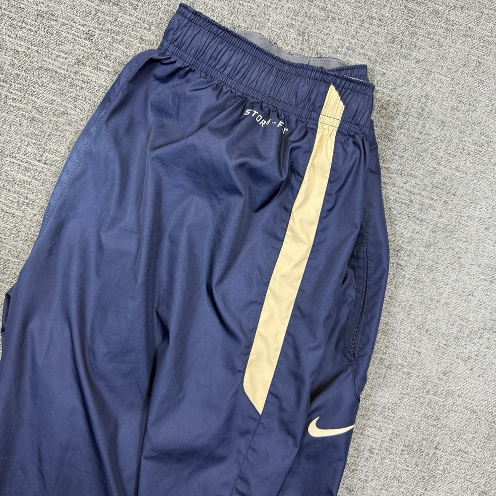 Nike Pants Mens Large‎ Blue Storm Fit Baggy Track Windbreaker Swoosh Pockets